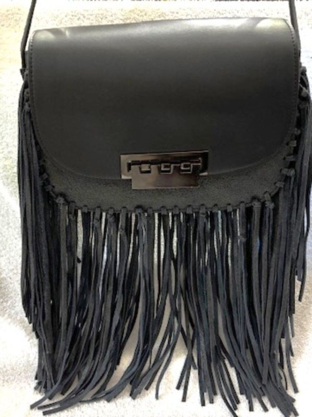 ZAC Zac Posen black leather crossbody with fringe accents and adjustable strap